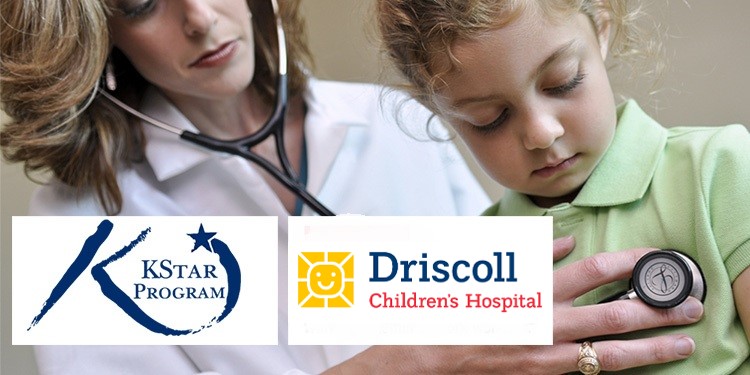 kstar-driscoll-doctor-with-stethascope-checking-child.jpg